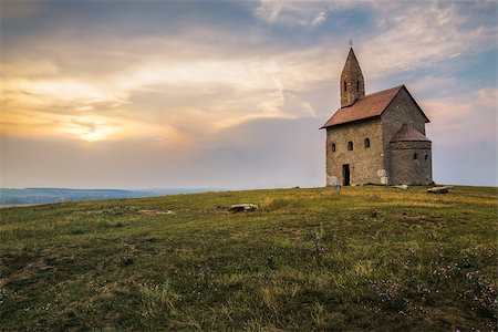 st michael - Old Roman Catholic Church of St. Michael the Archangel on the Hill at Sunset in Drazovce, Slovakia Stock Photo - Budget Royalty-Free & Subscription, Code: 400-07979566