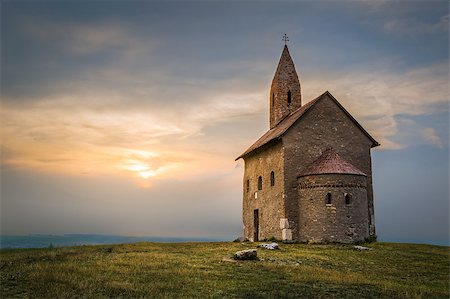 st michael - Old Roman Catholic Church of St. Michael the Archangel on the Hill at Sunset in Drazovce, Slovakia Stock Photo - Budget Royalty-Free & Subscription, Code: 400-07979567