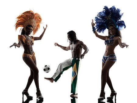 samba dancing with women - Brazilian women samba dancer and soccer player man dancing silhouette on white background Stock Photo - Budget Royalty-Free & Subscription, Code: 400-07973333