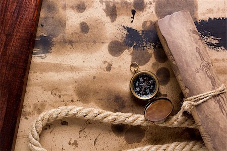 Compass and marine rope with a rolled scroll. Stock Photo - Budget Royalty-Free & Subscription, Code: 400-07984421