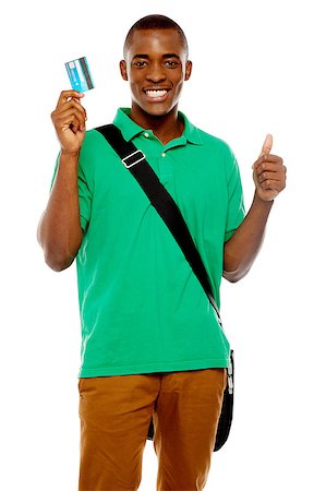 simsearch:400-06858518,k - Smiling african student showing credit card to camera and with thumbs up gesture Stock Photo - Budget Royalty-Free & Subscription, Code: 400-07987471