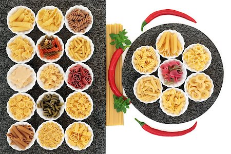 Italian pasta food selection with herb and spice food ingredients on marble over white background. Stock Photo - Budget Royalty-Free & Subscription, Code: 400-07994150