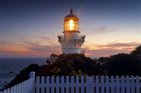 A long exposure taken after sundown of the Sugarloaf Point Lighthouse, Seal Rocks Australia Stock Photo - Budget Royalty-Free & Subscription, Code: 400-07995724