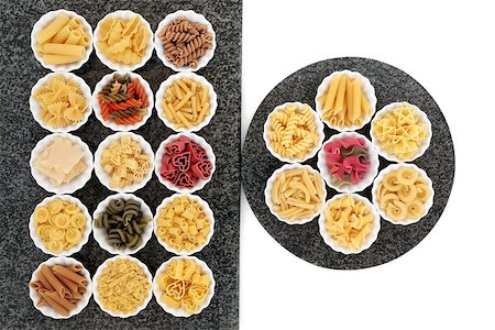 Pasta dried food selection in porcelain crinkle bowls on marble rectangle and round slabs over white background. Stock Photo - Budget Royalty-Free & Subscription, Code: 400-07993693