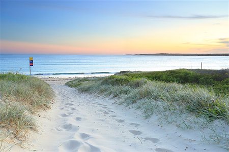 Soft sandy track leading down to Greenhills Beach Bate Bay at sundown.  South Sydney Australia. Stock Photo - Budget Royalty-Free & Subscription, Code: 400-07993952