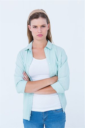 Upset hipster looking at camera on white background Stock Photo - Budget Royalty-Free & Subscription, Code: 400-08018290