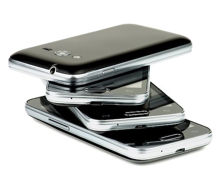 Stack of Contemporary Black Smartphones with Silver Details isolated on white background Foto de stock - Super Valor sin royalties y Suscripción, Código: 400-08011818