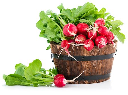 simsearch:400-04211564,k - Fresh radish with green leaves in wooden bucket. Isolated on white background Photographie de stock - Aubaine LD & Abonnement, Code: 400-08022272