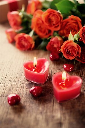 simsearch:400-08034169,k - Two burning candles in form of heart on a wooden background Stock Photo - Budget Royalty-Free & Subscription, Code: 400-08034176