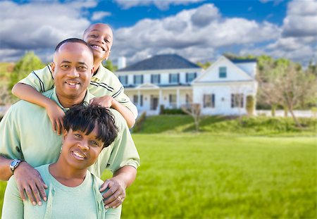Happy African American Family In Front of Beautiful House. Foto de stock - Super Valor sin royalties y Suscripción, Código: 400-08034236