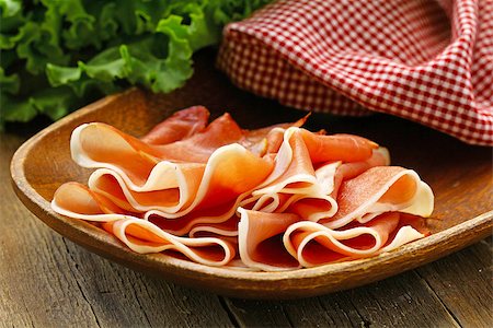 simsearch:400-04885499,k - parma ham (jamon) sliced on a wooden board Stock Photo - Budget Royalty-Free & Subscription, Code: 400-08035104