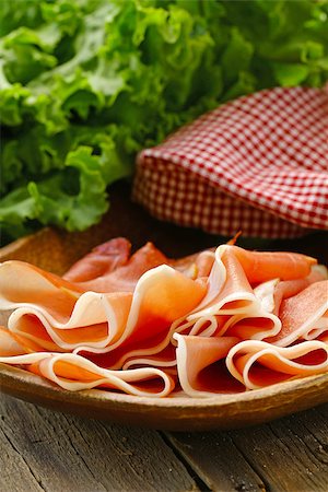 simsearch:400-04885499,k - parma ham (jamon) sliced on a wooden board Stock Photo - Budget Royalty-Free & Subscription, Code: 400-08035101