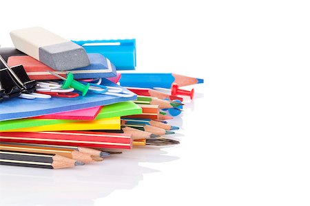 School and office supplies heap. Isolated on white background with copy space Stock Photo - Budget Royalty-Free & Subscription, Code: 400-08037305