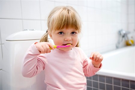 Baby Girl with toothbrush in the bathroom Stock Photo - Budget Royalty-Free & Subscription, Code: 400-08032408