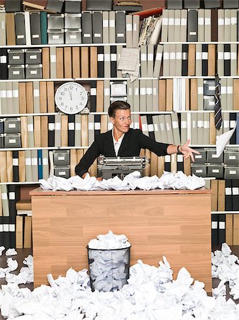 Frustrated Female Author in a messy office Stock Photo - Budget Royalty-Free & Subscription, Code: 400-08032750