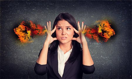 experiencing - Concrete gray wall with fissure. Experiencing woman with fire from ears Stock Photo - Budget Royalty-Free & Subscription, Code: 400-08043075