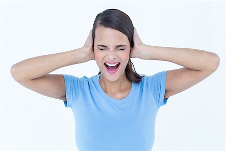 Screaming woman covering her ears on white background Stock Photo - Budget Royalty-Free & Subscription, Code: 400-08055986