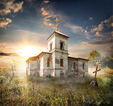 dark eerie sky - Abandoned church near the cemetery in a field Stock Photo - Budget Royalty-Free & Subscription, Code: 400-08051966