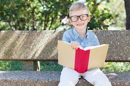 simsearch:695-03381153,k - smiling little boy in glasses studying, back to school concept Stock Photo - Budget Royalty-Free & Subscription, Code: 400-08053088