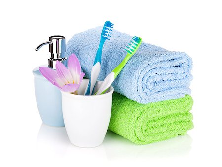 simsearch:400-05370670,k - Toothbrushes, soap and two towels. Isolated on white background Stock Photo - Budget Royalty-Free & Subscription, Code: 400-08075672