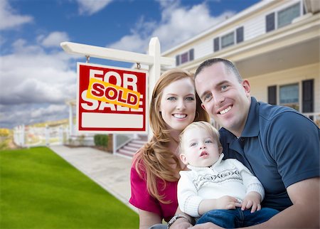 family and army - Happy Young Military Family in Front of Sold Real Estate Sign and New House. Stock Photo - Budget Royalty-Free & Subscription, Code: 400-08070498