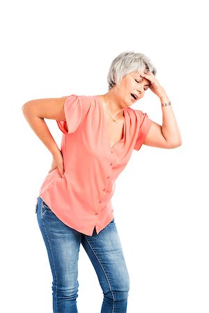 Portrait of a elderly woman with a headache, isolated on a white background Foto de stock - Super Valor sin royalties y Suscripción, Código: 400-08070694