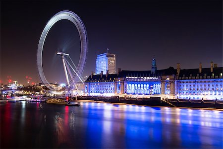 London, UK â?? January 18, 2015: City of London with London Eye. The London Eye is a giant Ferris wheel on the bank of River Thames. It is a European landmark and an iconic symbol of London, England, United Kingdom. Stock Photo - Budget Royalty-Free & Subscription, Code: 400-08070944