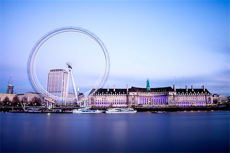 London, UK â?? January 18, 2015: City of London with London Eye. The London Eye is a giant Ferris wheel on the bank of River Thames. It is a European landmark and an iconic symbol of London, England, United Kingdom. Stock Photo - Budget Royalty-Free & Subscription, Code: 400-08070942