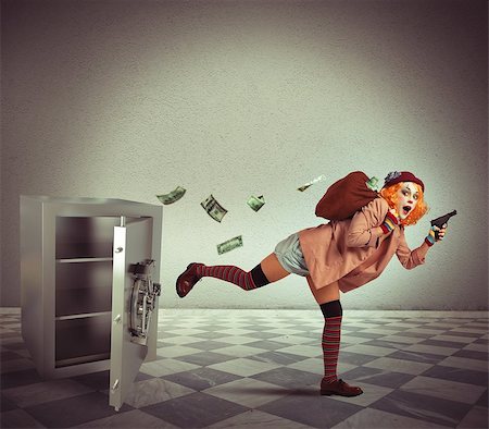 security costume - Clown steals from the safe and escapes Stock Photo - Budget Royalty-Free & Subscription, Code: 400-08072687