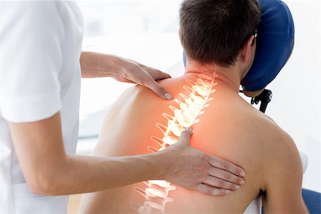 Digital composite of Highlighted spine of man at physiotherapy Stock Photo - Budget Royalty-Free & Subscription, Code: 400-08098737