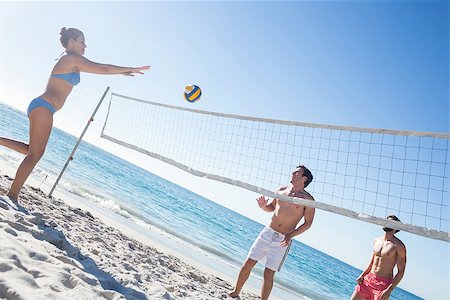simsearch:632-01161489,k - Friends playing volleyball at the beach Foto de stock - Super Valor sin royalties y Suscripción, Código: 400-08099388