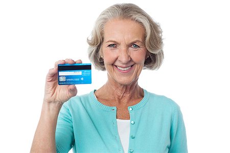 simsearch:400-06858518,k - Happy senior lady displaying her credit card. Stock Photo - Budget Royalty-Free & Subscription, Code: 400-08107913