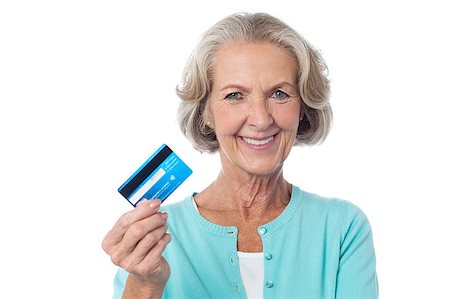 simsearch:400-06858518,k - Senior woman displaying her cash card Stock Photo - Budget Royalty-Free & Subscription, Code: 400-08107924