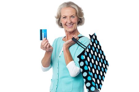 simsearch:400-06858518,k - Joyous shopaholic senior woman posing Stock Photo - Budget Royalty-Free & Subscription, Code: 400-08107962