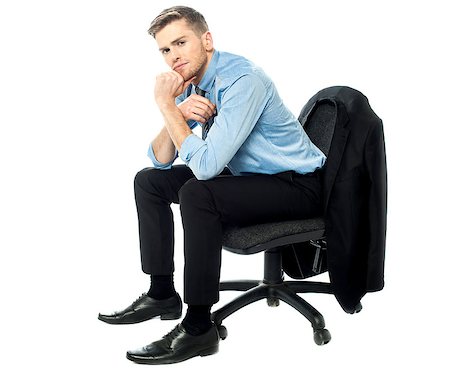 Corporate guy sitting on the chair and thinking Stock Photo - Budget Royalty-Free & Subscription, Code: 400-08108087