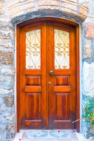 simsearch:400-07257534,k - stone walls and a door in the medieval style Stock Photo - Budget Royalty-Free & Subscription, Code: 400-08108536