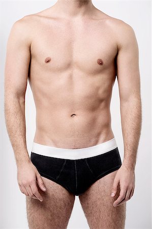 Cropped image of young man in underwear Stock Photo - Budget Royalty-Free & Subscription, Code: 400-08109386