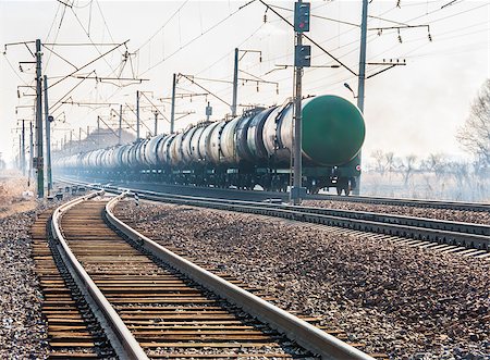 The railroad and the passing train on the railway tanks Stock Photo - Budget Royalty-Free & Subscription, Code: 400-08109841