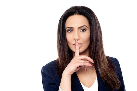 simsearch:400-04175955,k - Beautiful businesswoman with finger on lips, shhh!! Stock Photo - Budget Royalty-Free & Subscription, Code: 400-08110524