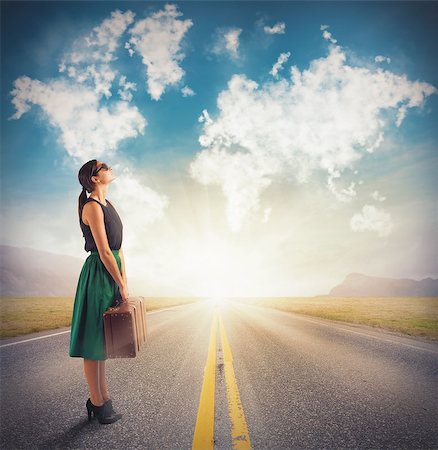 Woman sees in clouds her next destination Stock Photo - Budget Royalty-Free & Subscription, Code: 400-08111405