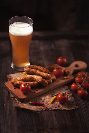 simsearch:400-04587885,k - Grilled sausage with beer on wodden table Stock Photo - Budget Royalty-Free & Subscription, Code: 400-08111462