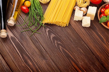 simsearch:400-06796273,k - Italian food cooking ingredients. Pasta, tomatoes, basil. Top view with copy space Stock Photo - Budget Royalty-Free & Subscription, Code: 400-08111975