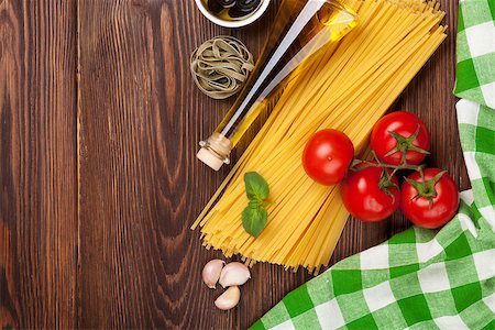 simsearch:400-06796273,k - Italian food cooking ingredients. Pasta, tomatoes, basil. Top view with copy space Stock Photo - Budget Royalty-Free & Subscription, Code: 400-08111978
