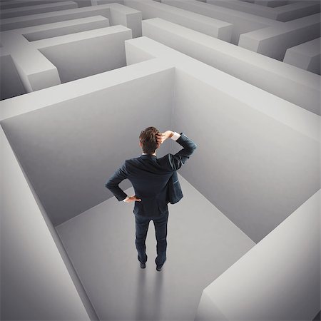 enigma - Businessman in trouble lost in a maze Stock Photo - Budget Royalty-Free & Subscription, Code: 400-08112126
