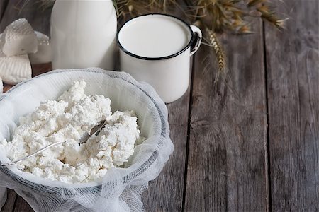 Tzfat cheese, milk, cottage cheese, wheat and oat grains on old wooden background. Concept of judaic holiday Shavuot. Stock Photo - Budget Royalty-Free & Subscription, Code: 400-08112750