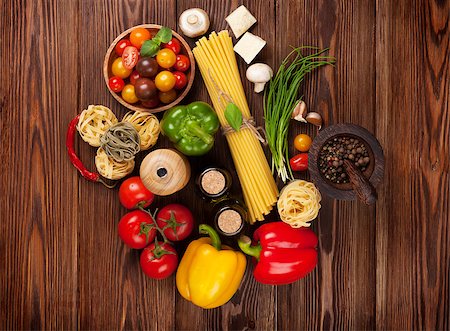 simsearch:400-06796273,k - Italian food cooking ingredients. Pasta, vegetables, spices. Top view Stock Photo - Budget Royalty-Free & Subscription, Code: 400-08113653