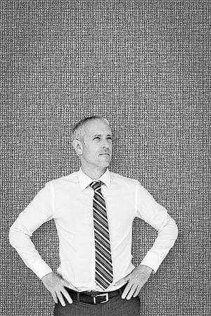 simsearch:400-04283915,k - Thinking businessman against grey background Stock Photo - Budget Royalty-Free & Subscription, Code: 400-08137310