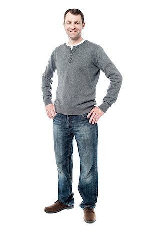 Handsome middle aged man posing with hands on hips Stock Photo - Budget Royalty-Free & Subscription, Code: 400-08130940