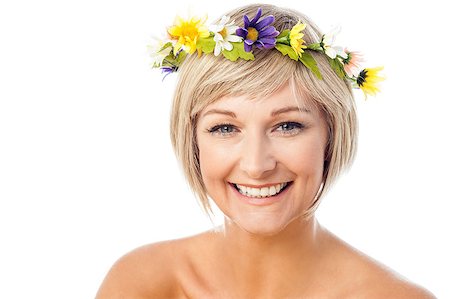 Attractive smiling woman with flower wreath on head Photographie de stock - Aubaine LD & Abonnement, Code: 400-08131093