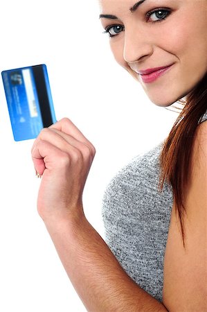 simsearch:400-06858518,k - Cropped image of a pretty woman posing sideways with a cash card in hand Stock Photo - Budget Royalty-Free & Subscription, Code: 400-08154285
